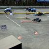 Air Force Afterbruner flies across the finish line while Rambunctious Powerslides wildly trying to catch up.