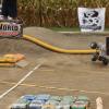 the truck lands hard and continues to cartwheel down the length of the track!!